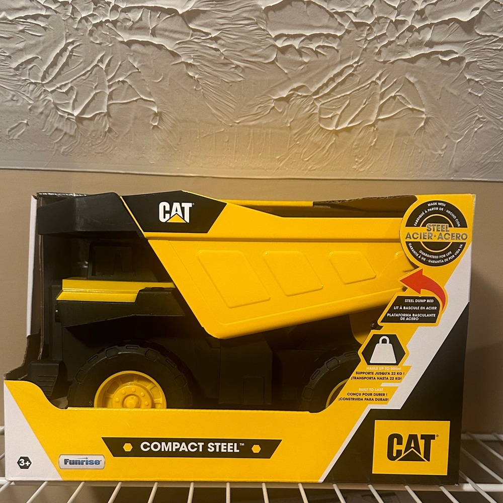 NWT CAT Compact Steel Yellow Dump Truck - Kids Toy